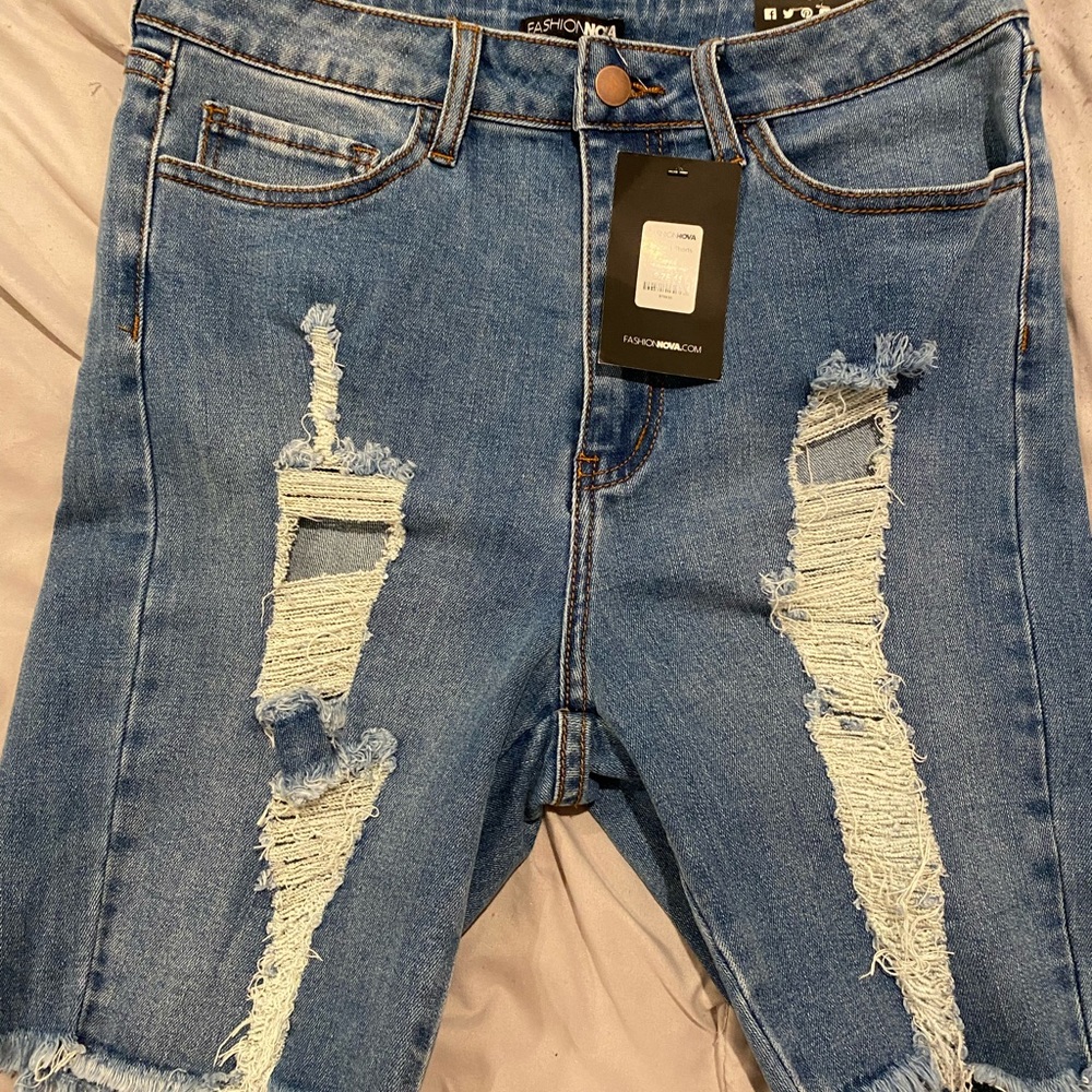 fashion nova distressed shorts, size 15, brand new with tags!